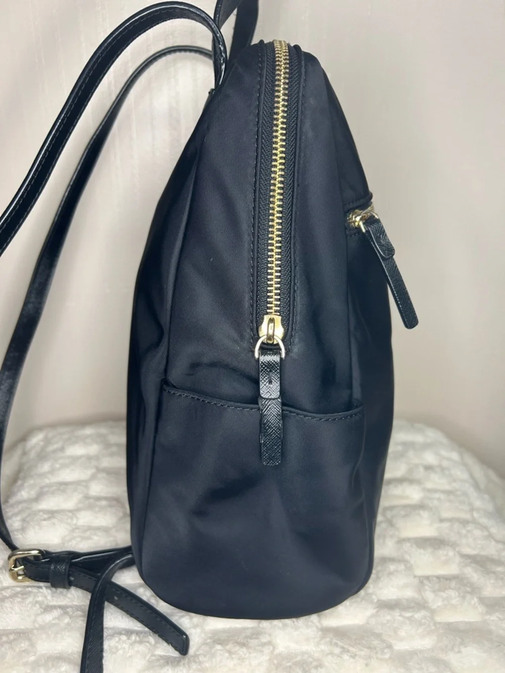 Kate Spade Blake Ave black nylon mini backpack with gold hardware